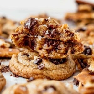 a toffee cookie broken in half to see the melted chocolate inside