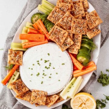 cottage cheese dip platter with crackers and veggies