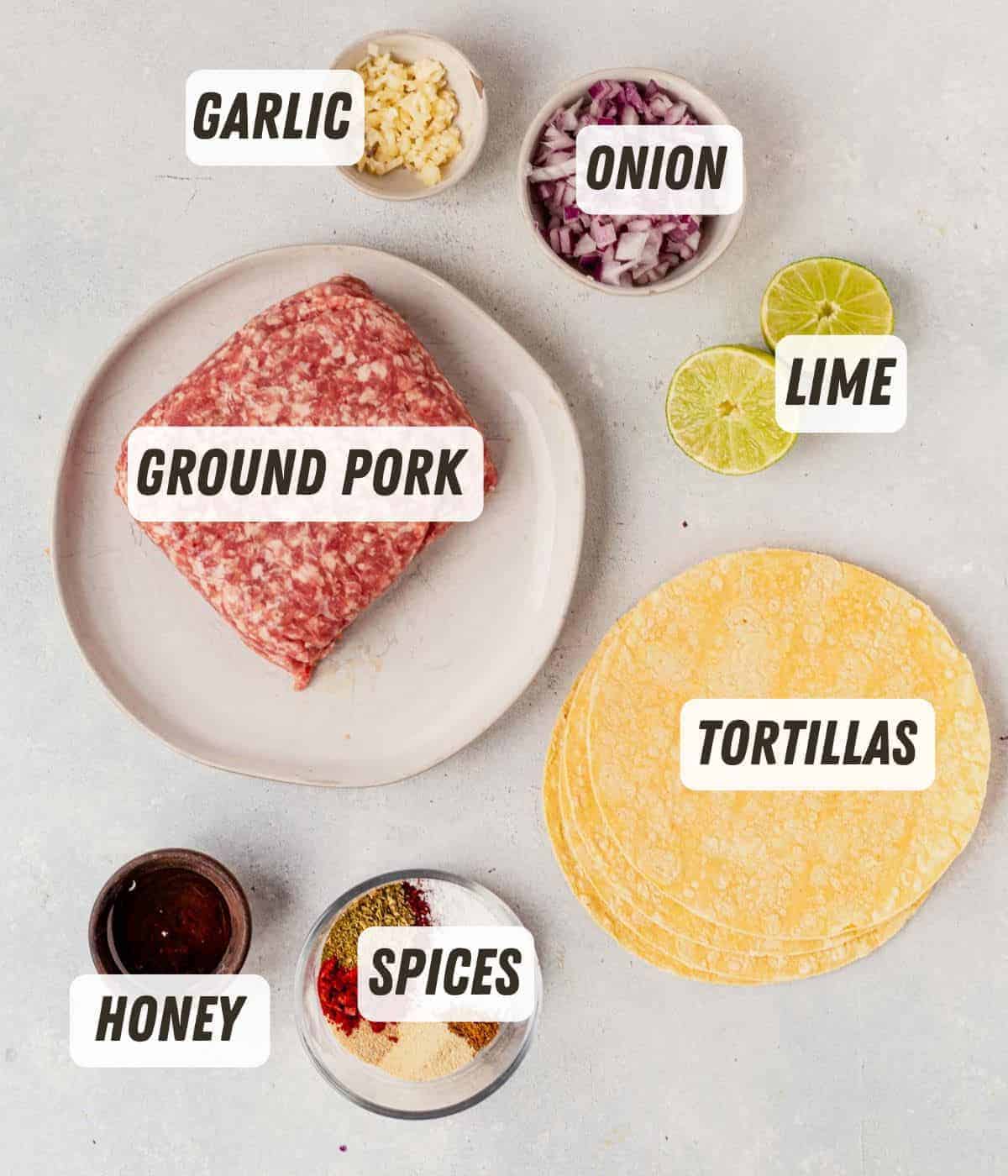 ingredients for ground pork tacos laid out on