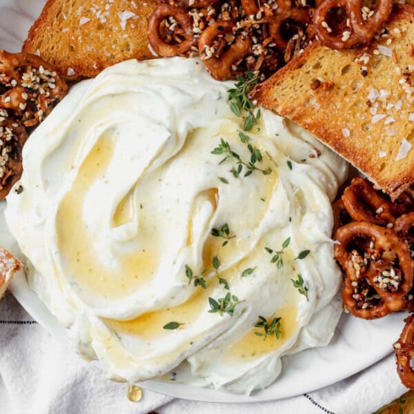 whipped goat cheese drizzled with hot honey and a side of crostini