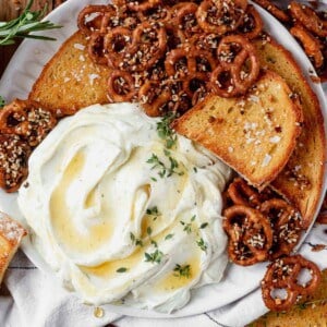 whipped goat cheese with toasted bread and pretzels