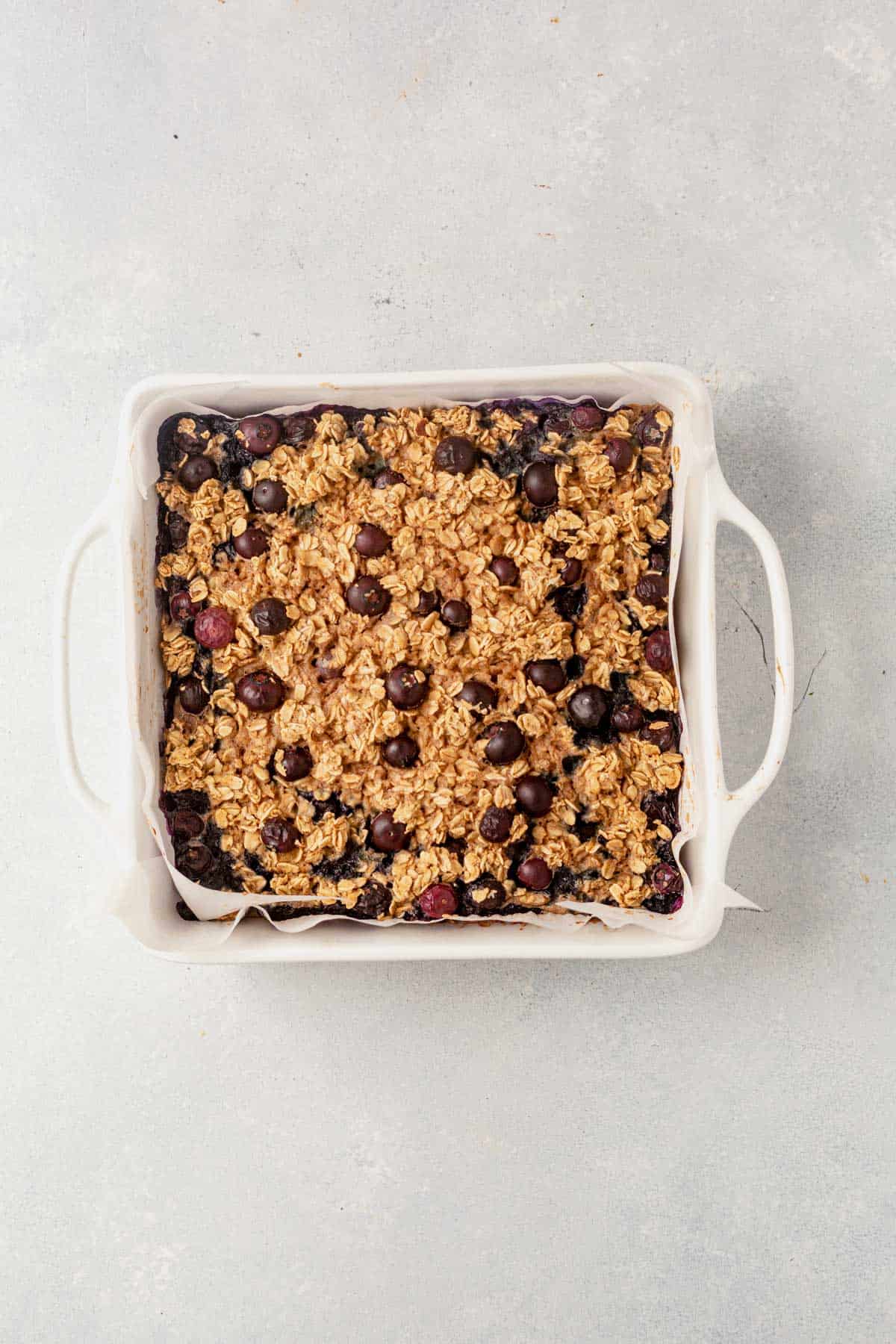 baked healthy blueberry baked oatmeal in a 9x9 baking dish