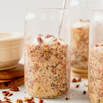 a jar of carrot cake overnight oats with a spoon