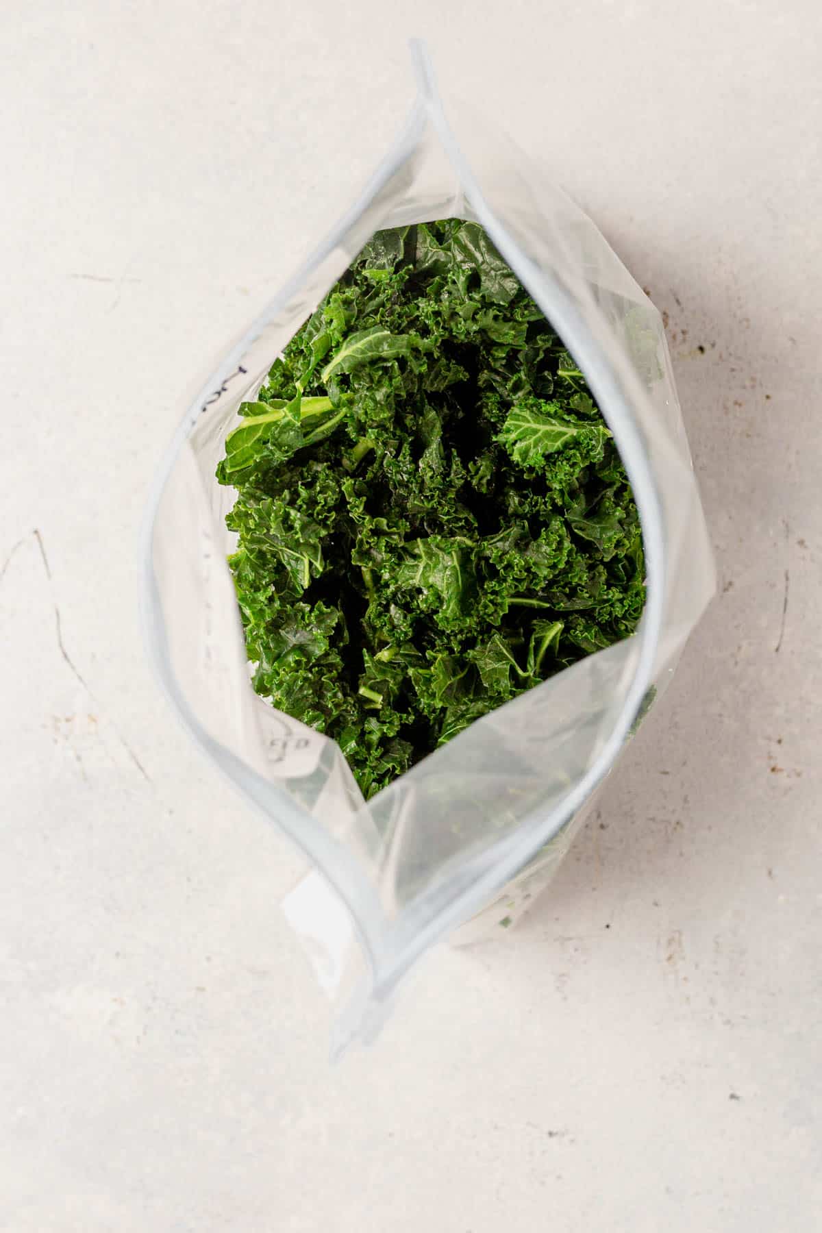 frozen kale in an airtight freezer bag