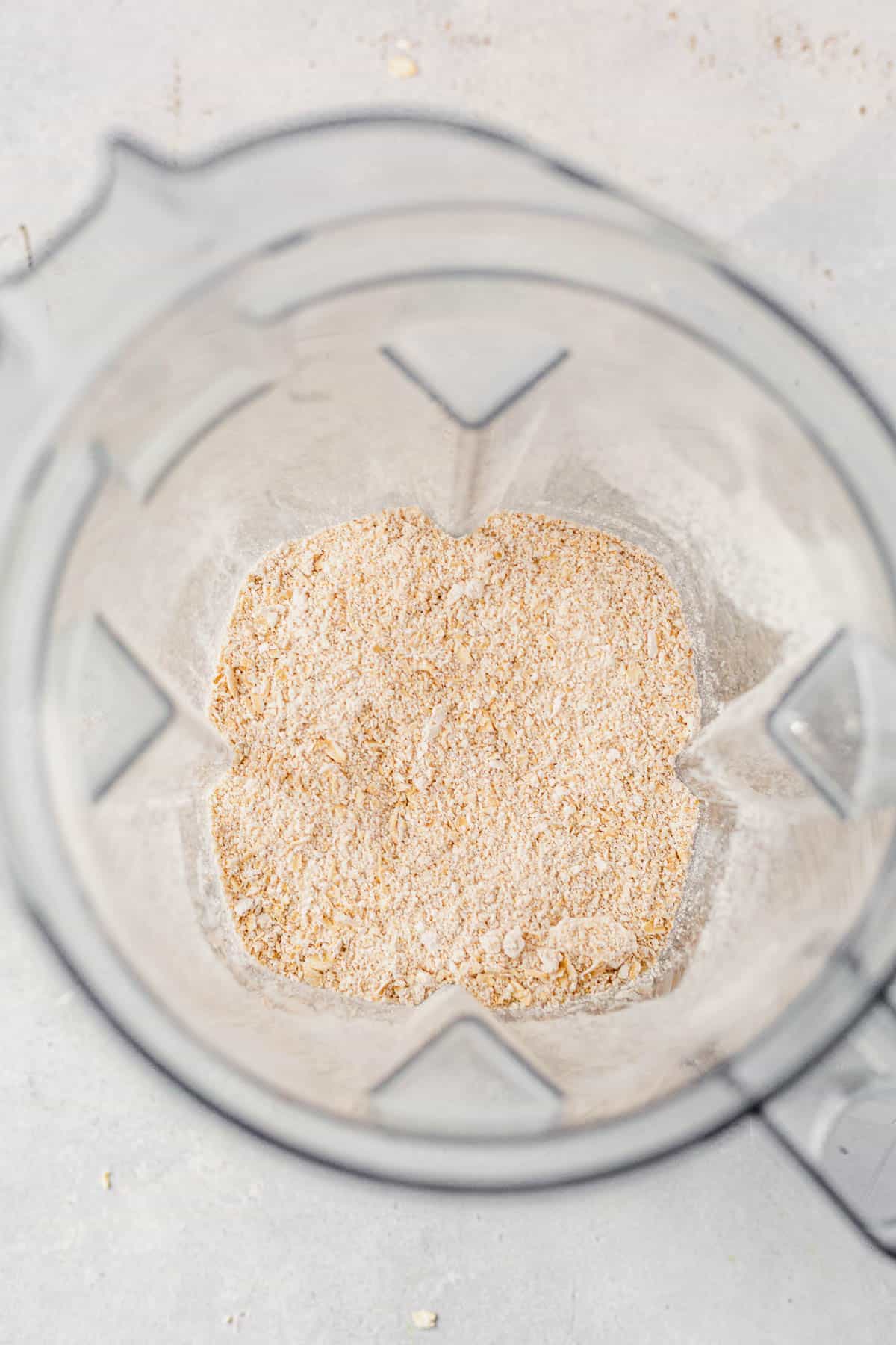 oat flour blended into a flour in a vitamix blender.