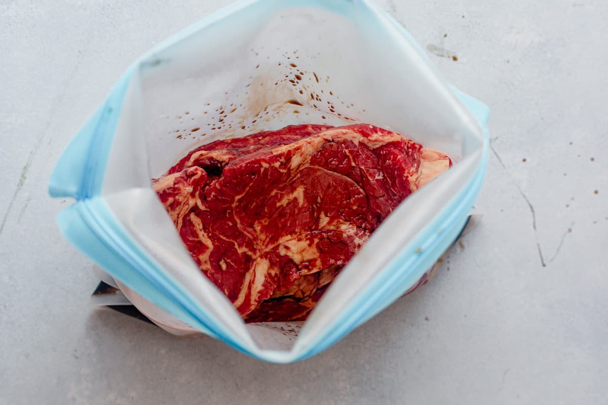 steak marinating in a bag