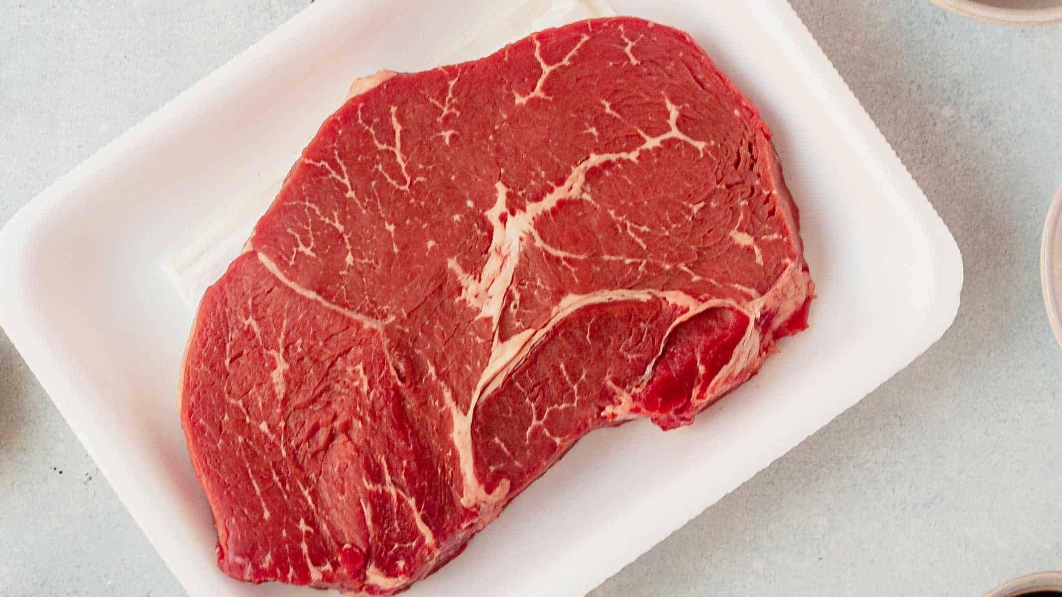 sirloin tip steak on a cutting board