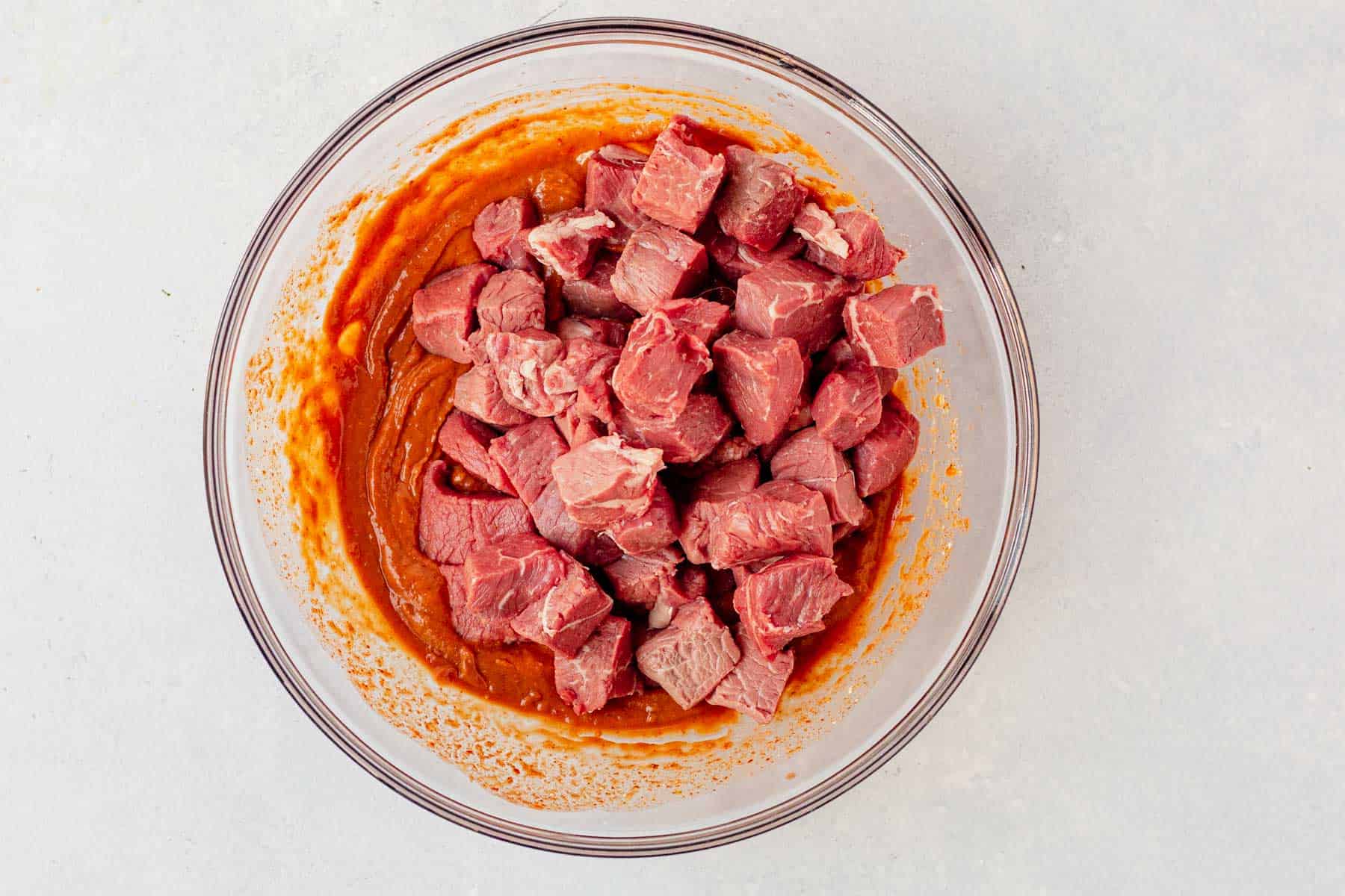 steak marinading in thai peanut sauce