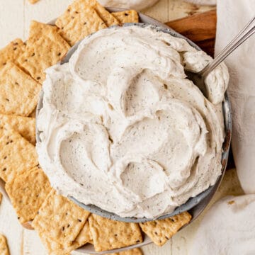 boursin cheese in a bowl with crackers