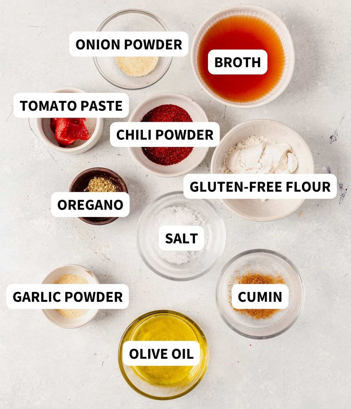 ingredients for gluten-free enchilada sauce on a countertop