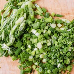 chopped green onions on a cutting board