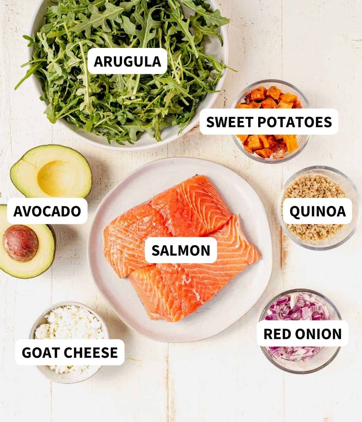 salmon arugula salad ingredients on a countertop