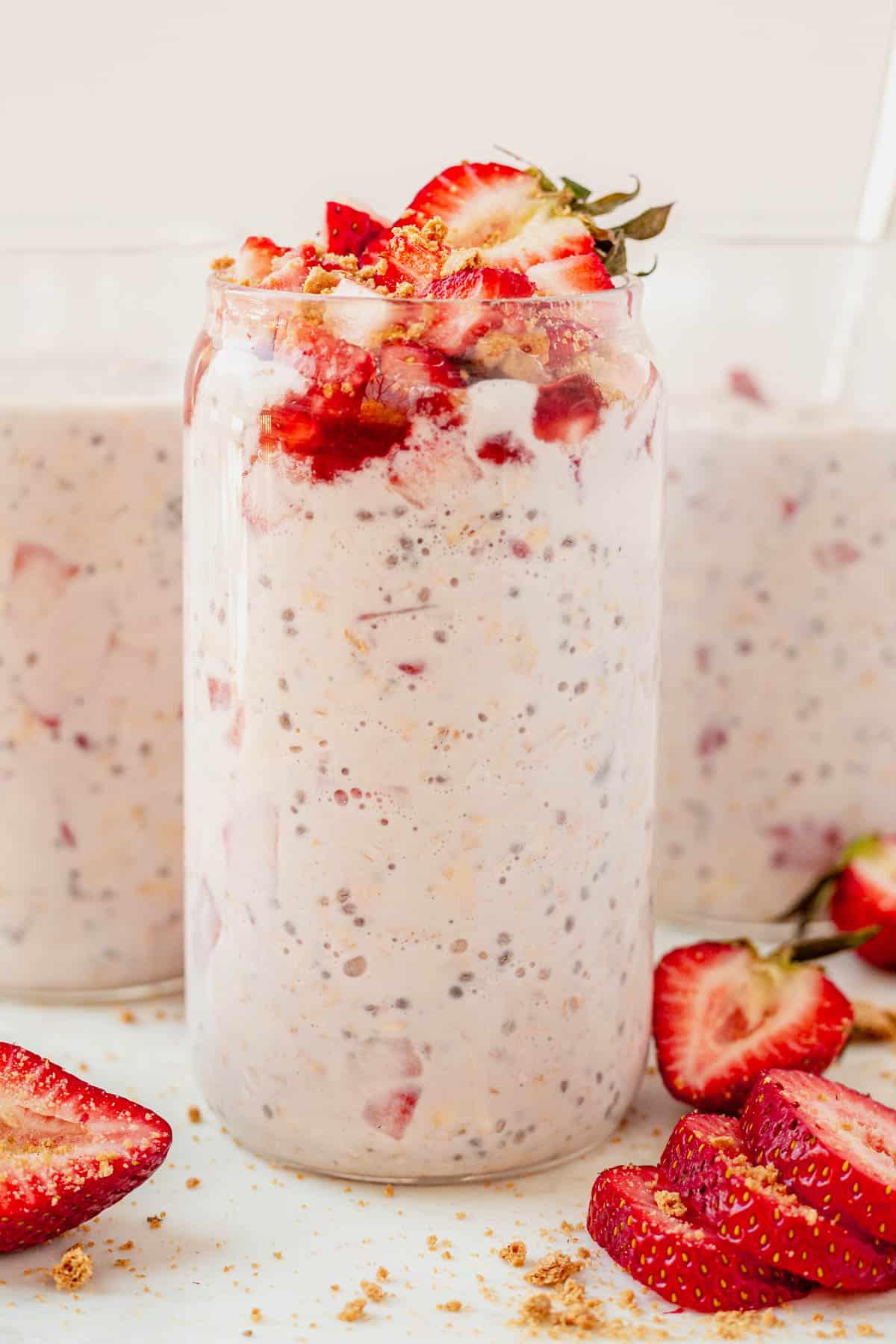 a jar of strawberry cheesecake overnight oats