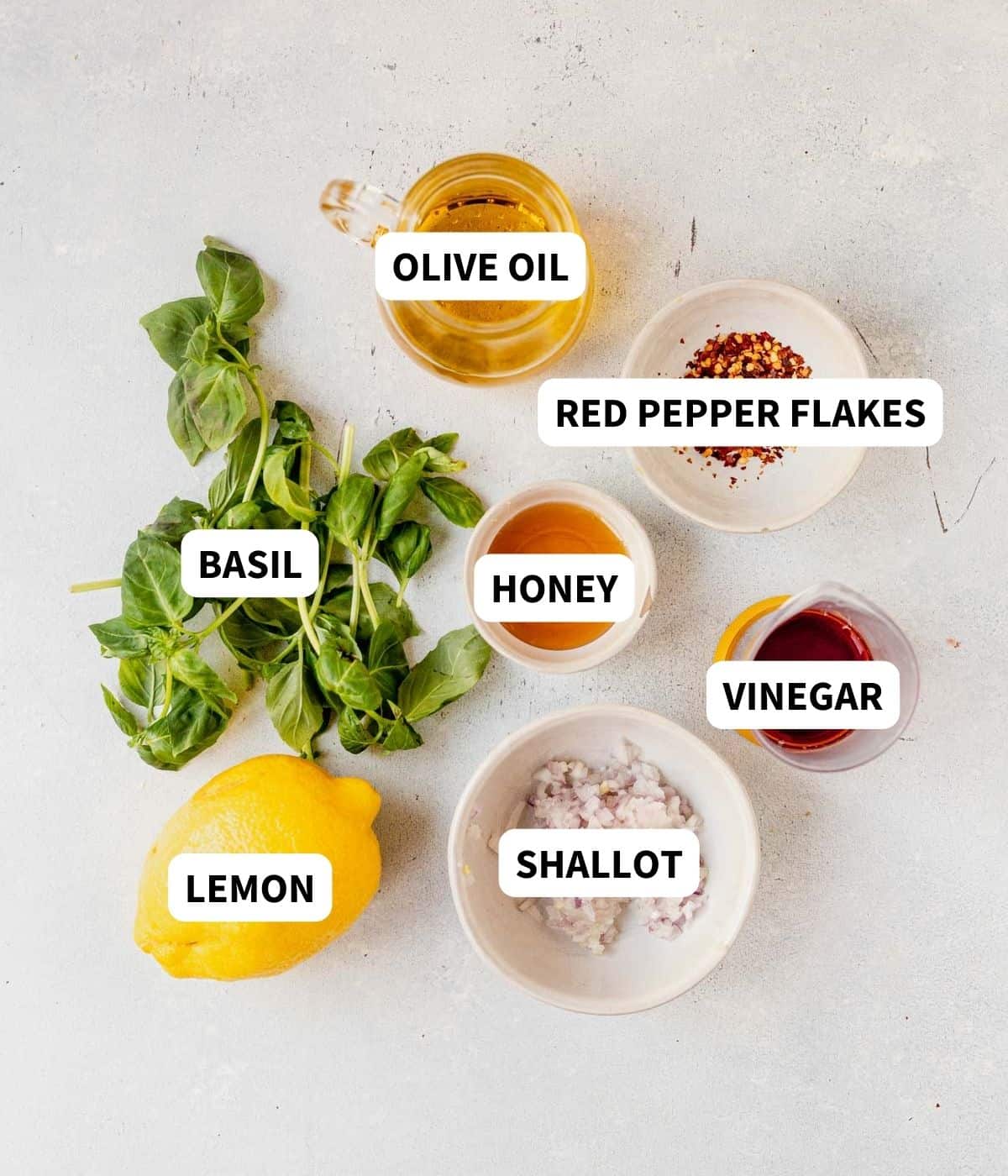 basil vinaigrette ingredients on a countertop