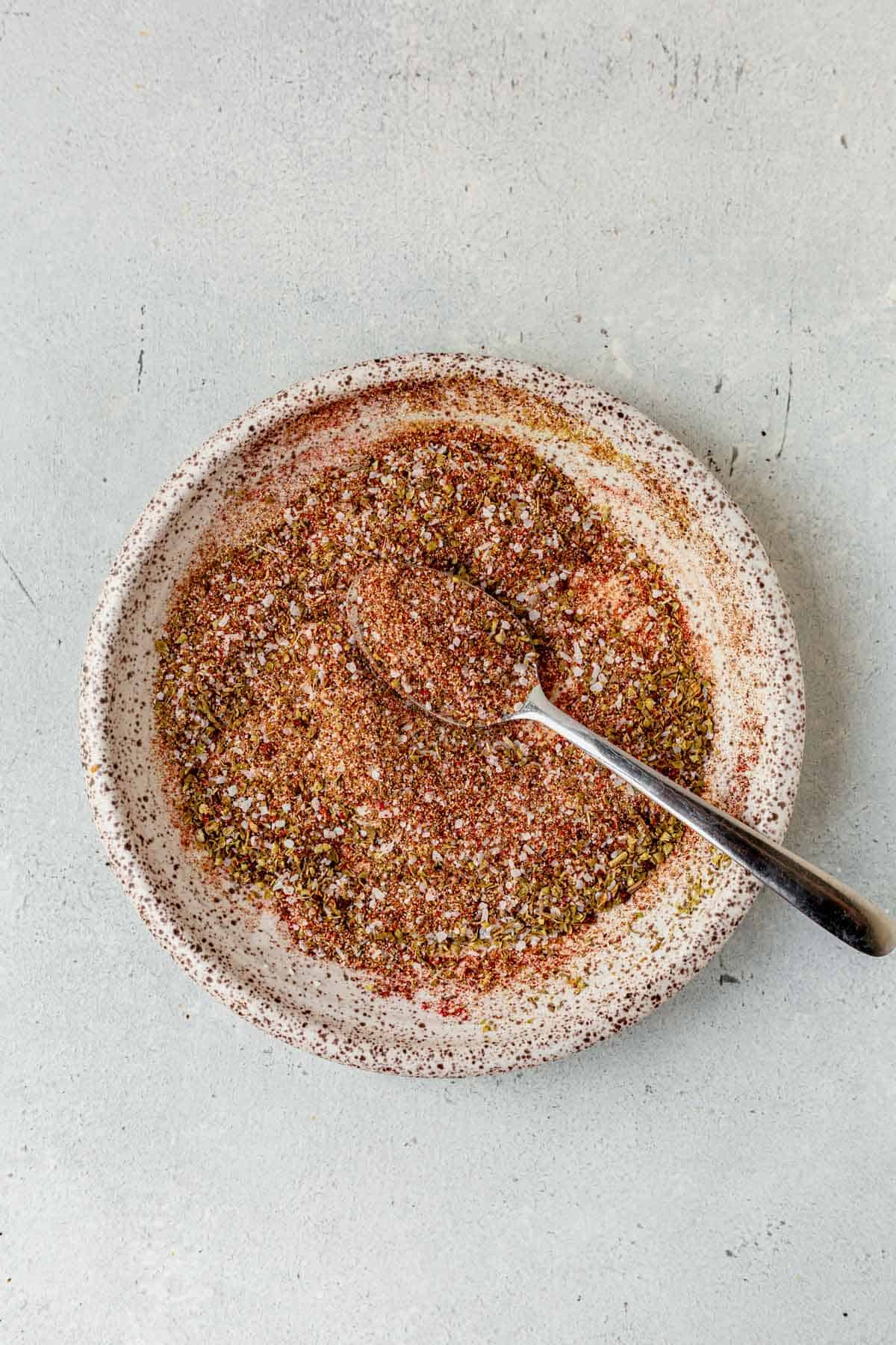 carnitas seasoning with a spoon