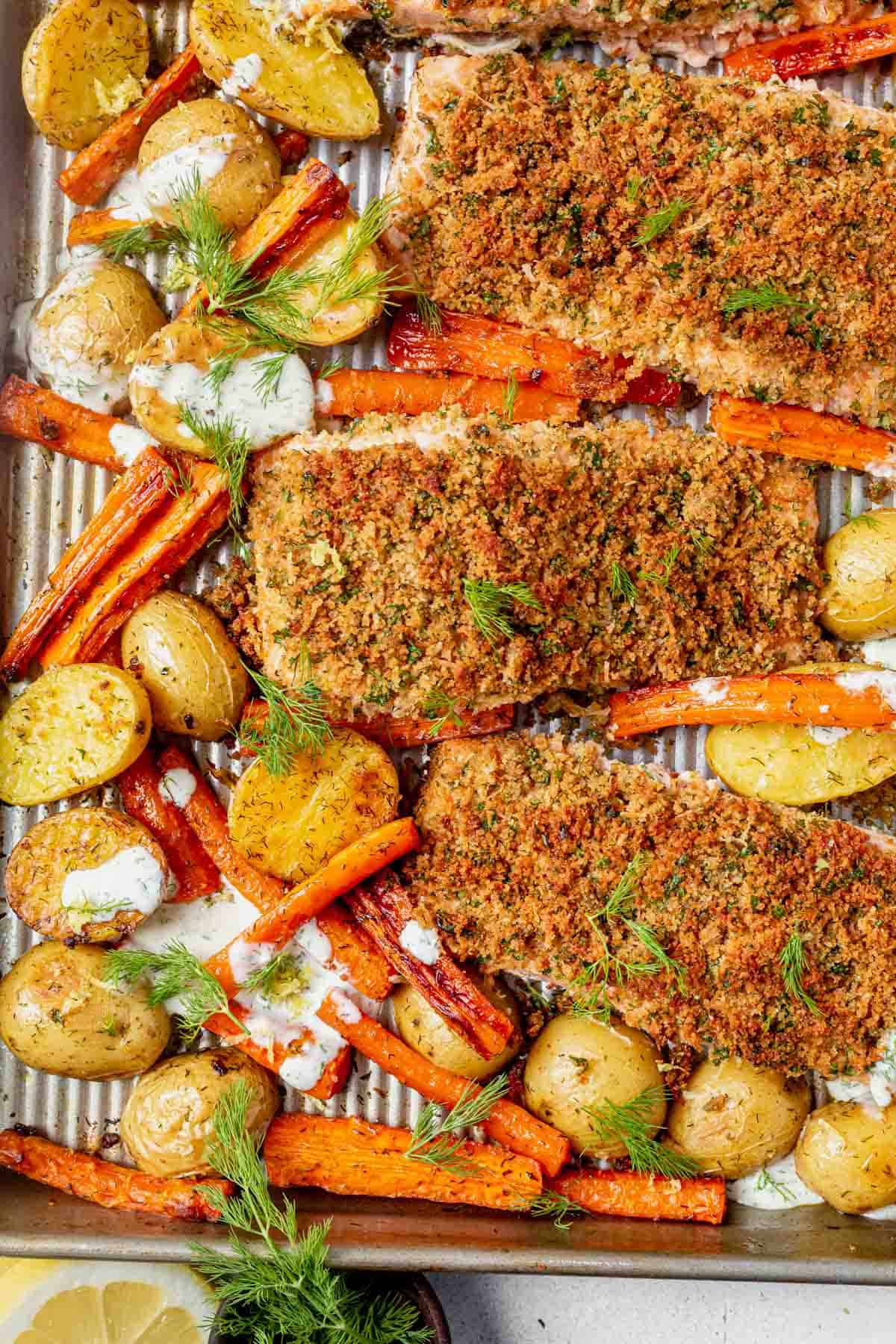 roasted potatoes and carrots with herb crusted salmon