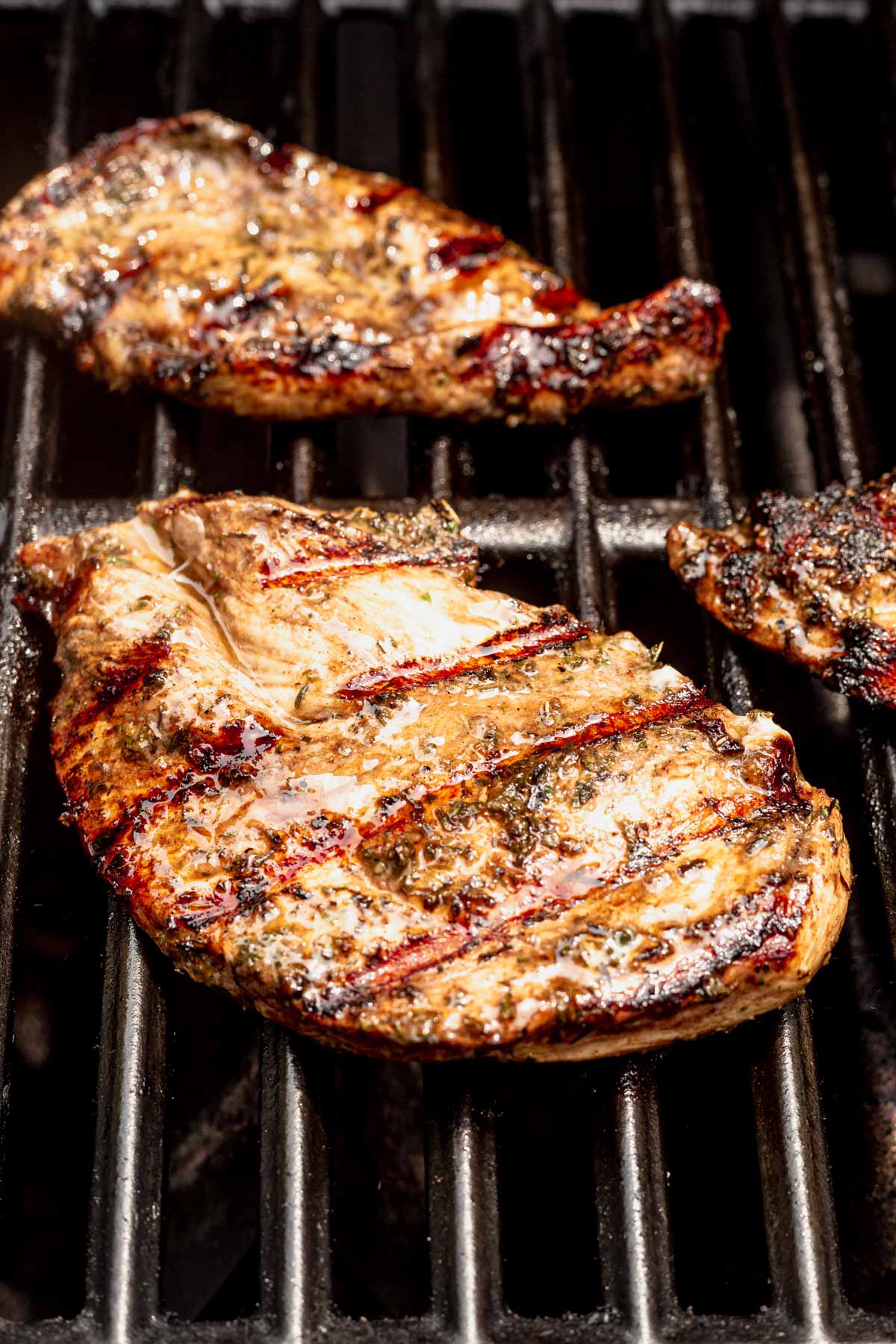 chicken breast on the grill with perfect grill marks