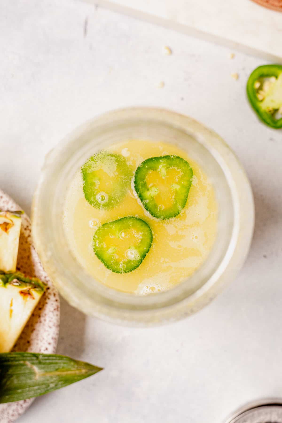 jalapeno slices in a pineapple margarita