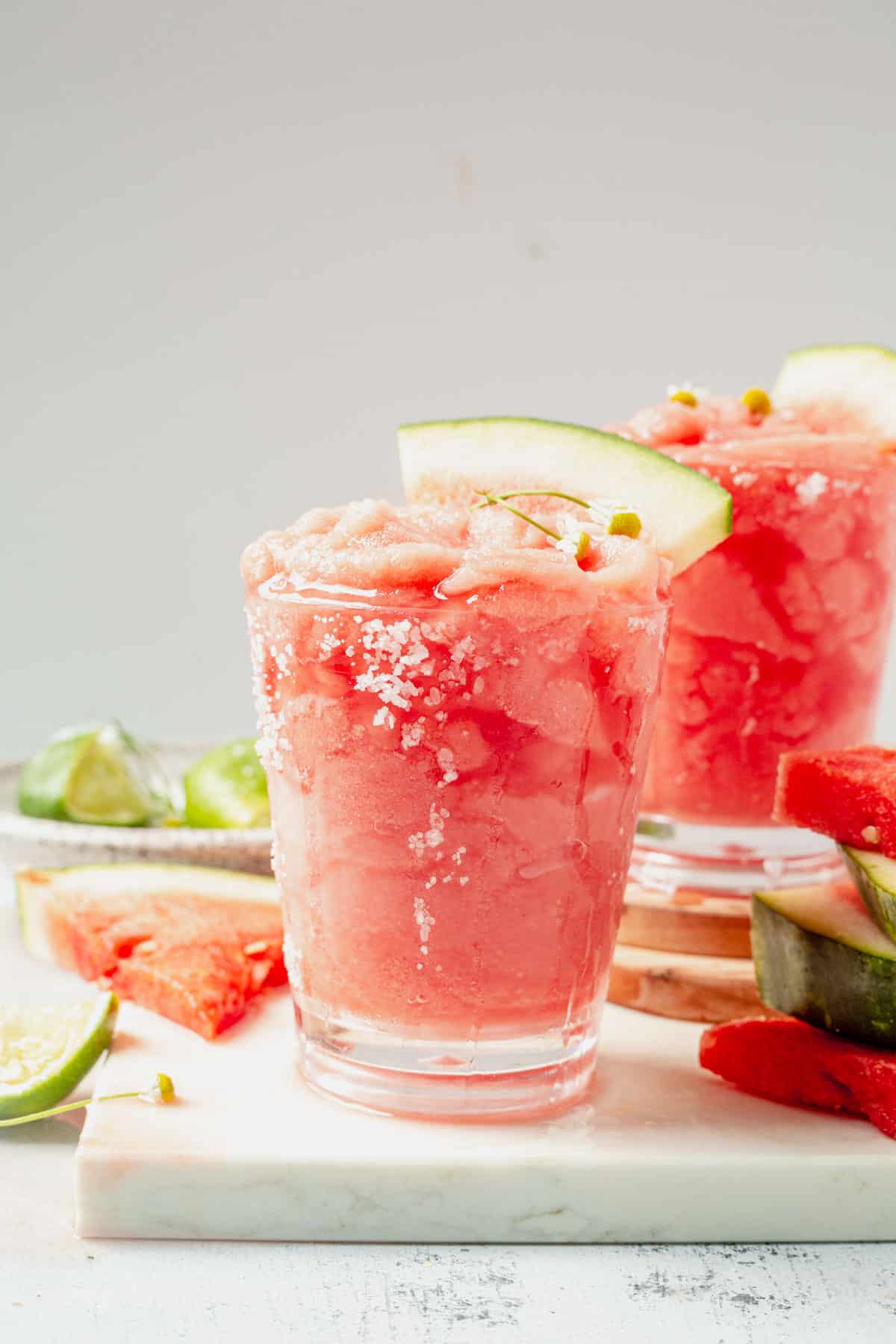 frozen watermelon margarita with a watermelon wedge