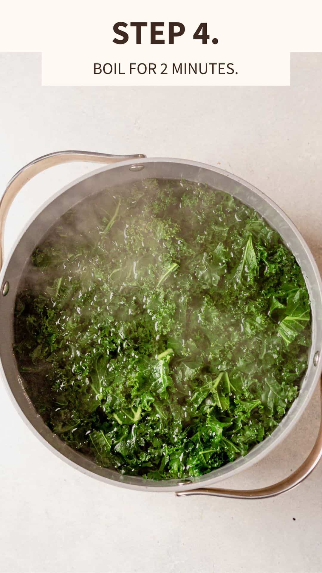 kale in a large stock pot of boiling water