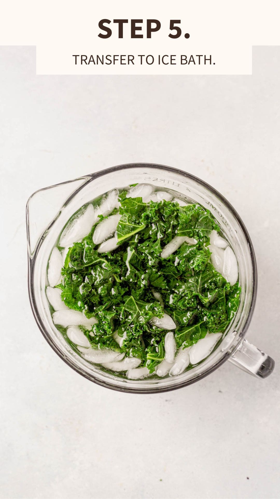 kale that's been boiled placed in an ice bath to be blanched