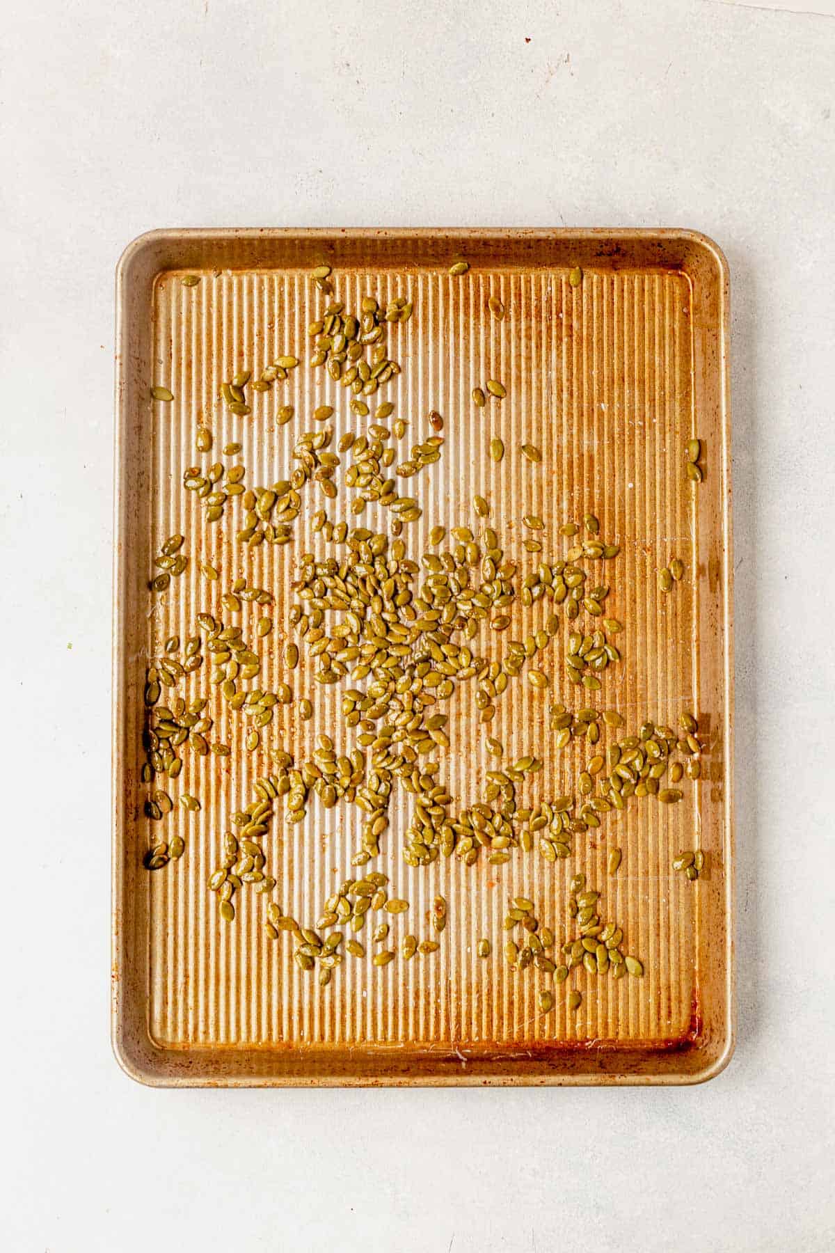 toasted pumpkin seeds on a sheet pan