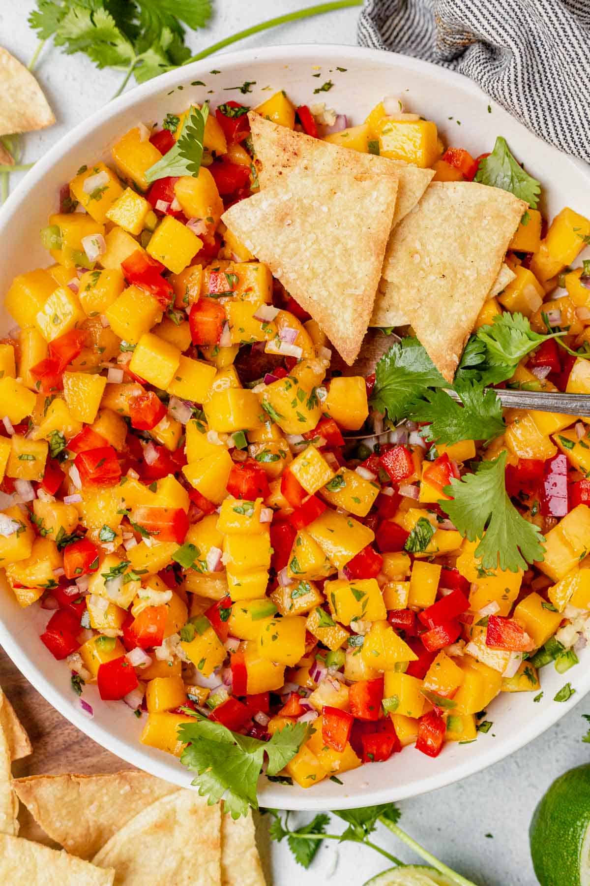 a bowl of peach mango salsa