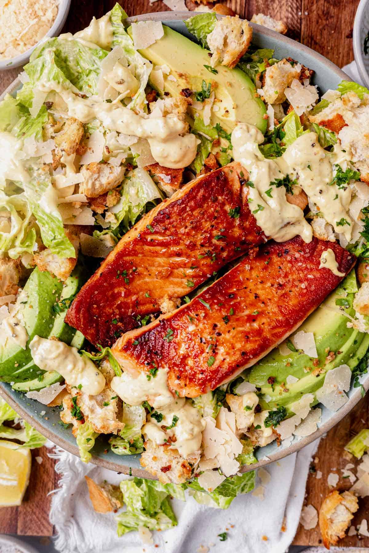 caesar salad with seared salmon and croutons