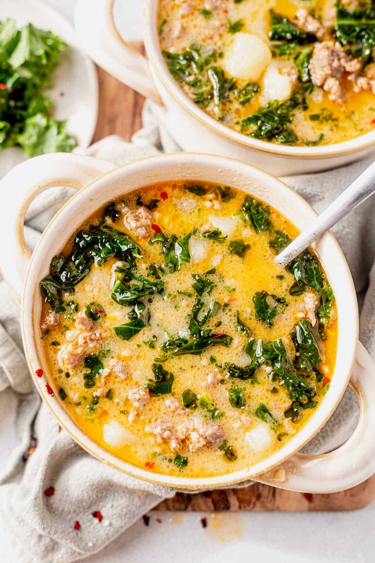 whole30 zuppa toscana in a bowl with a spoon