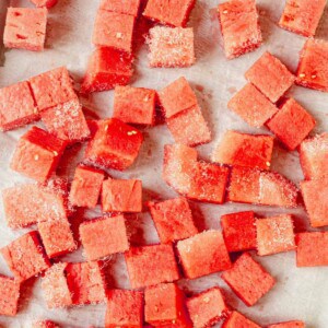 frozen watermelon cubes on a sheet pan