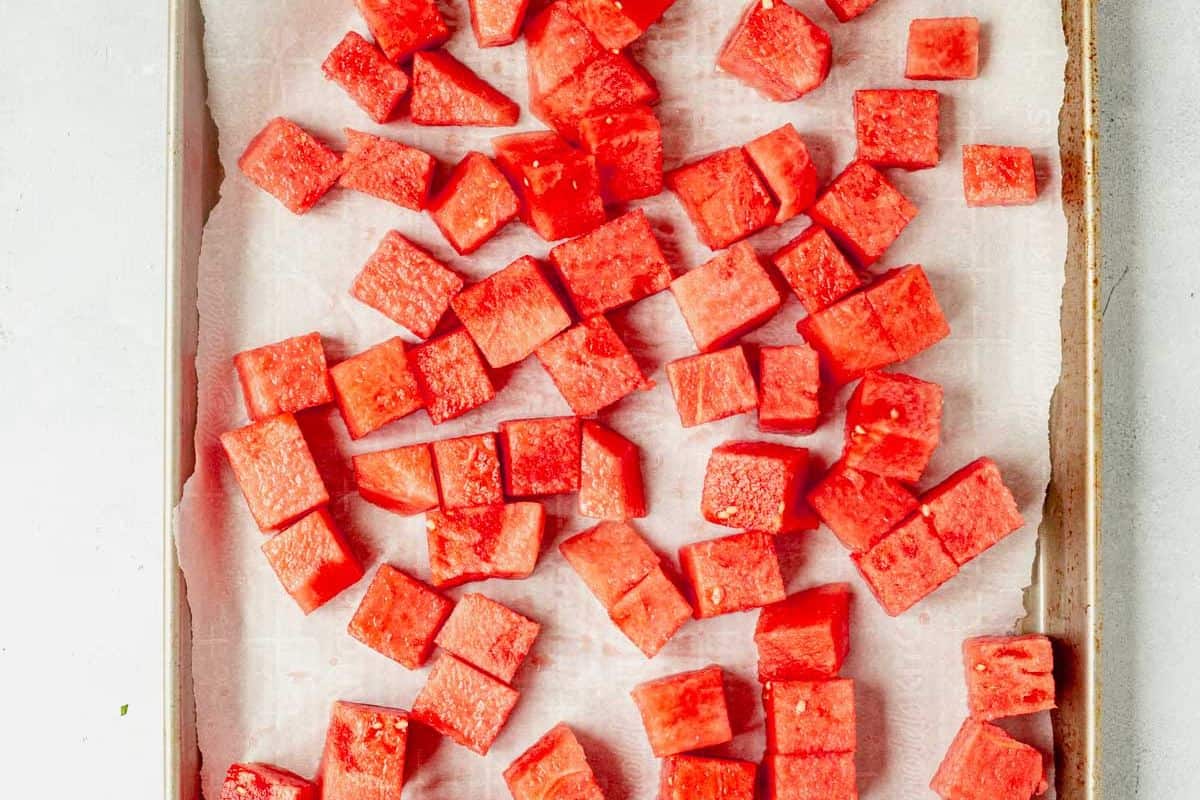 watermelon chunks on a baking sheet