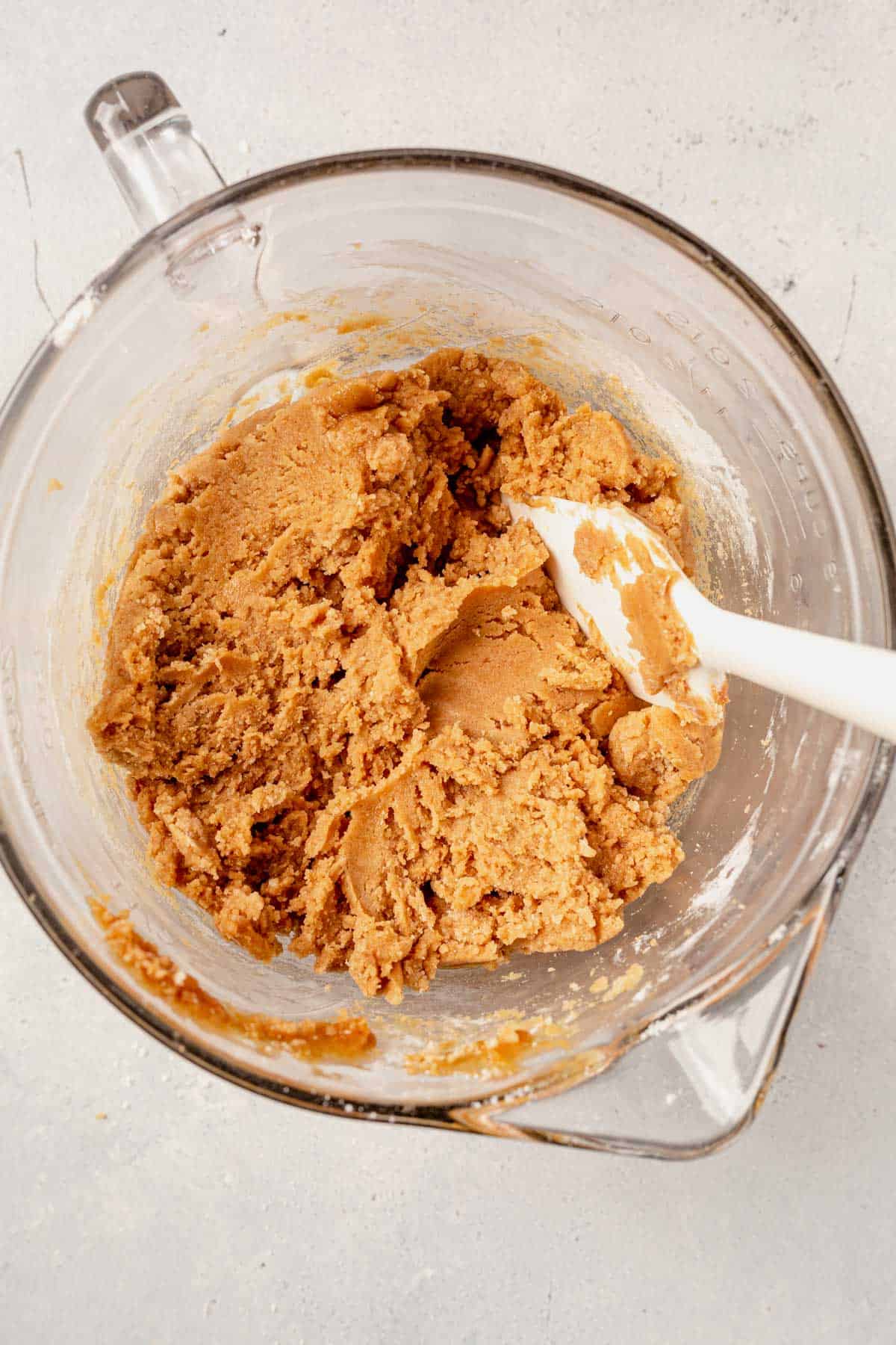 peanut butter cookie bar dough in a mixing bowl.