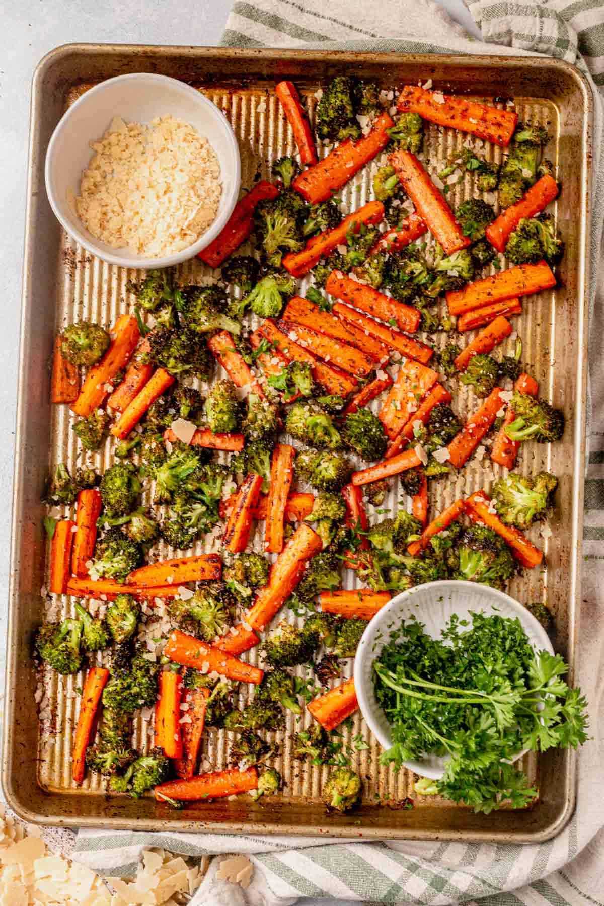 roasted broccoli and carrots ono a baking sheet