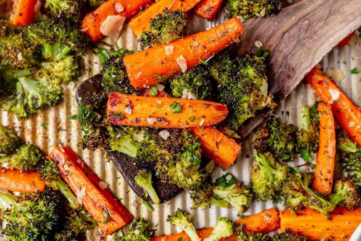 roasted broccoli and carrots on a spatula