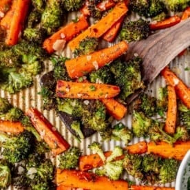 roasted broccoli and carrots on a sheet pan