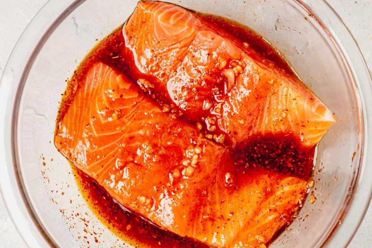 salmon fillets marinating in soy lime sauce