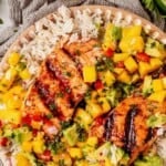 salmon with mango salsa on a bed of coconut rice