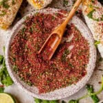 homemade elote seasoning in a small bowl with a wooden spoon