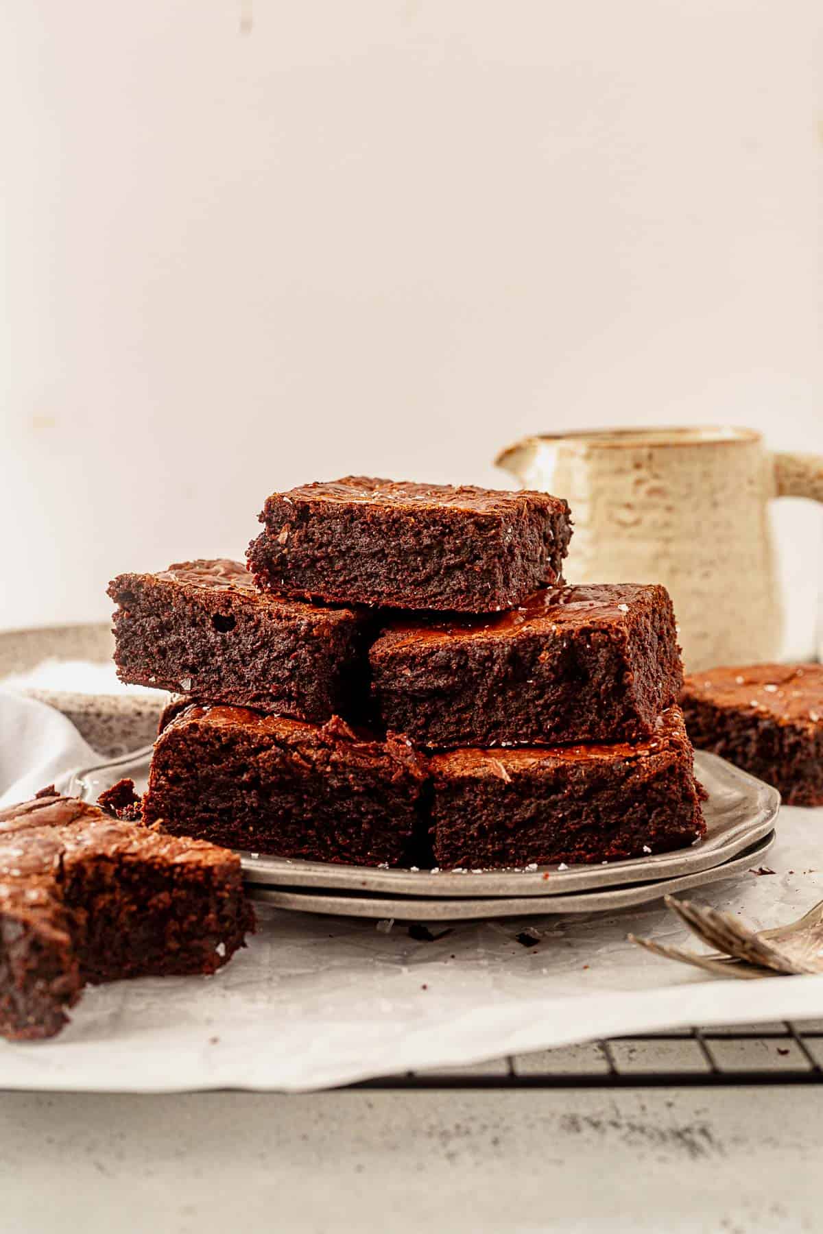 a stack of paleo brownies on a plate