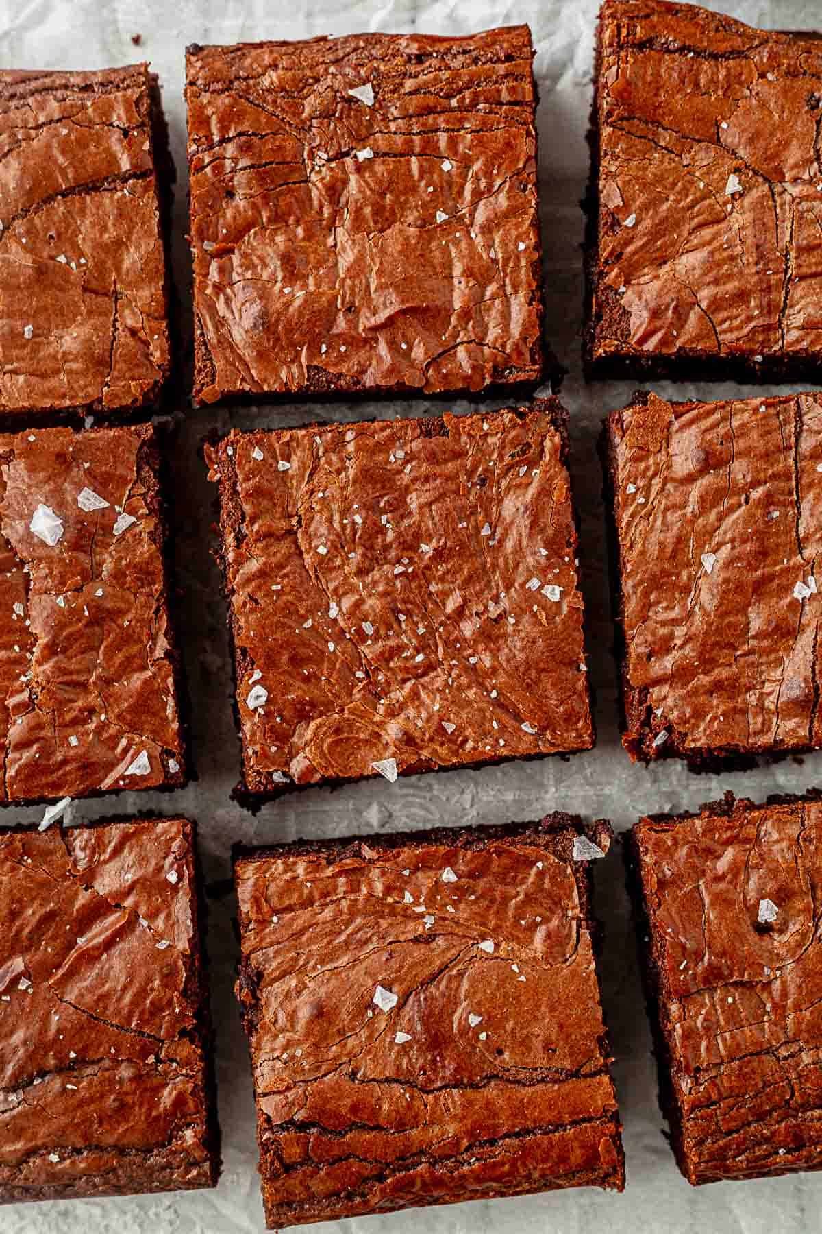 crackly top paleo brownies cut into squares
