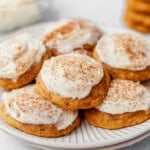 soft pumpkin cookies with cream cheese frosting on