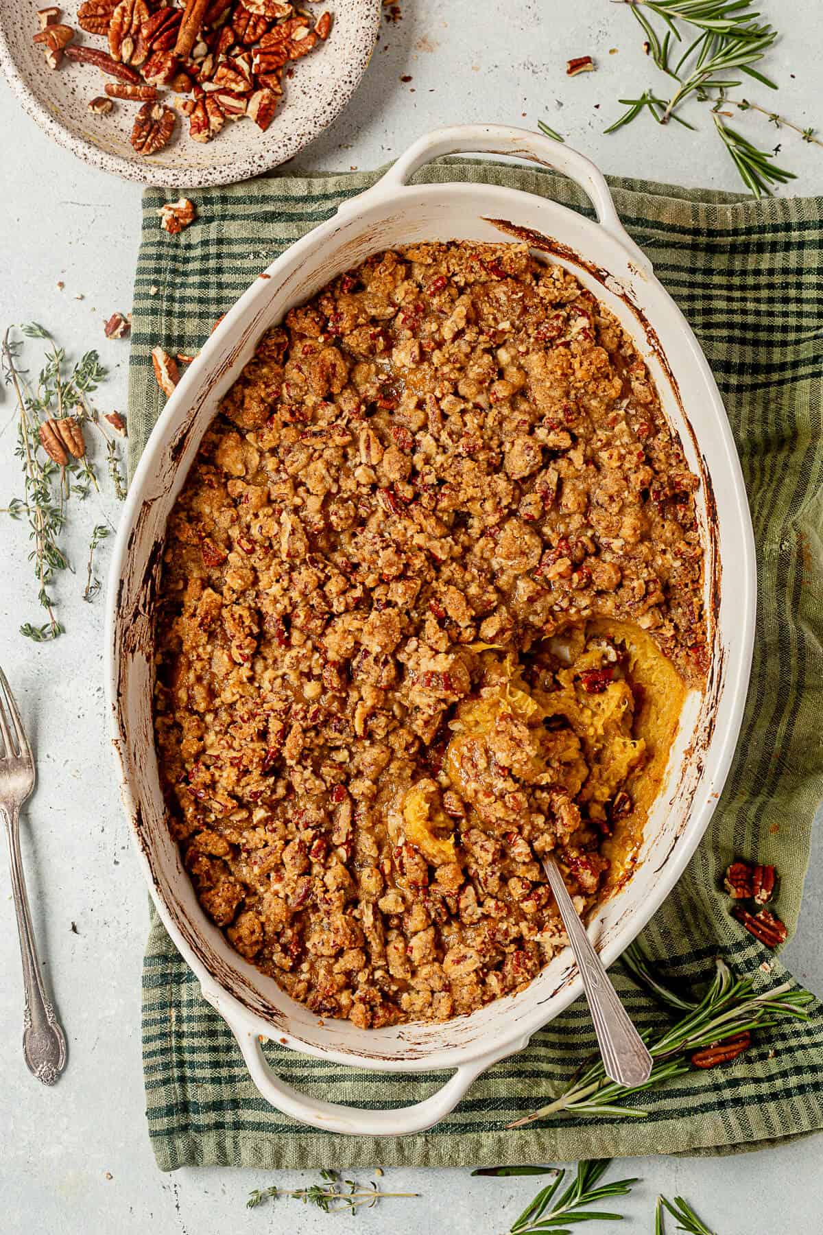 acorn squash casserole with a spoon in it