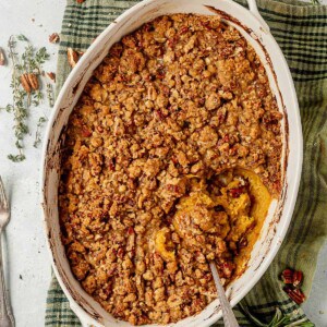 acorn squash casserole with part scooped out