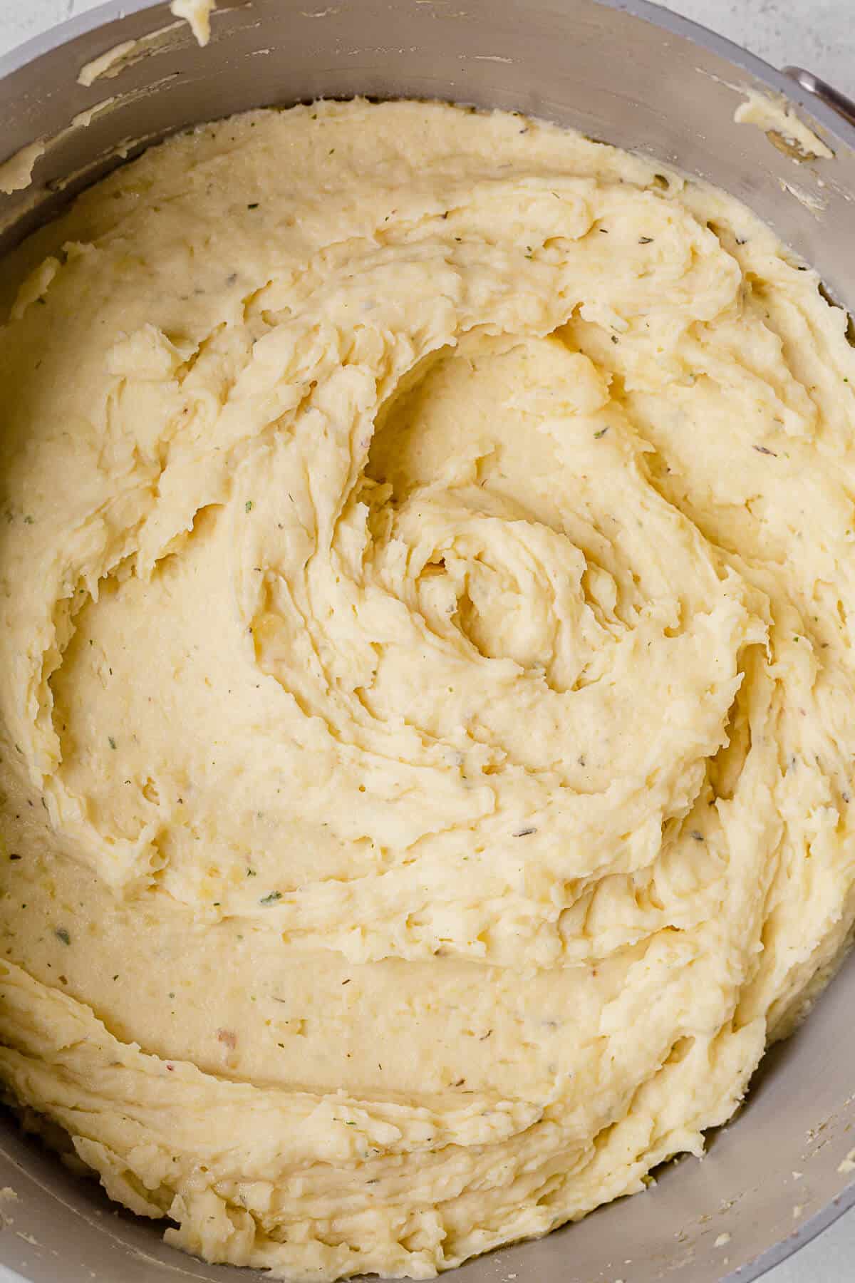 freshly mashed boursin mashed potatoes in a large pot