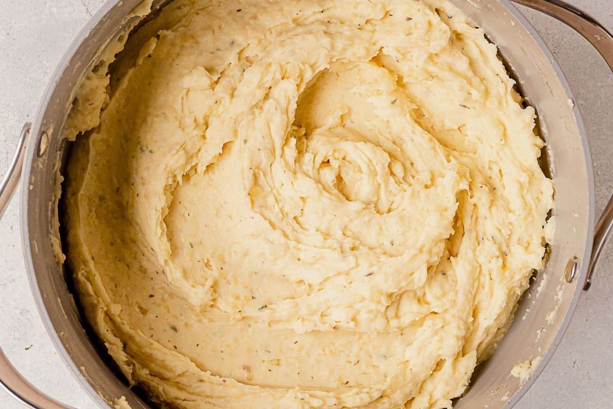 creamy boursin mashed potatoes in a large pot