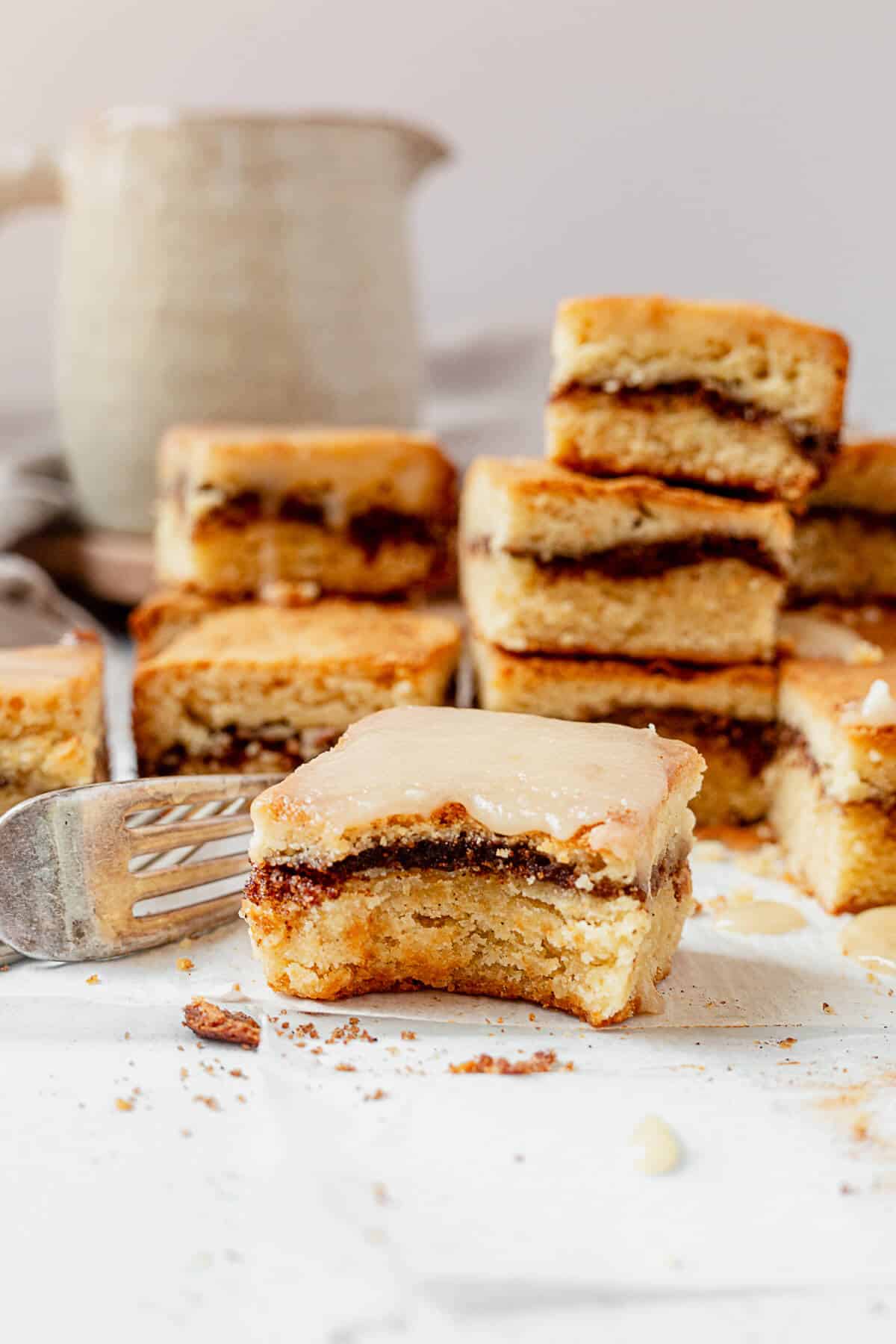 a chai swirled white chocolate brownie with a bite taken