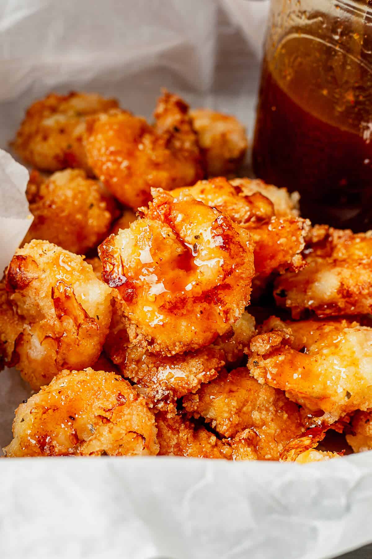 breaded shrimp coated in firecracker sauce