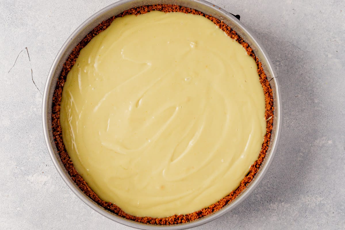 vegan banana cream pie setting in a springform pan