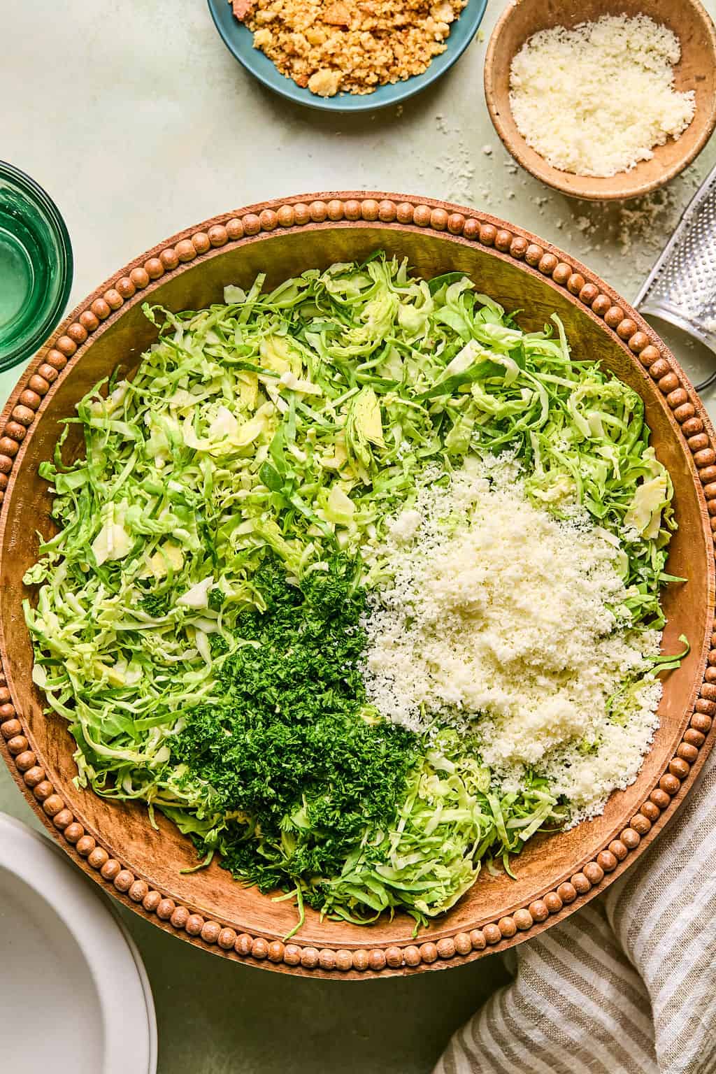 shredded brussels sprouts with parmesan cheese and parsley.