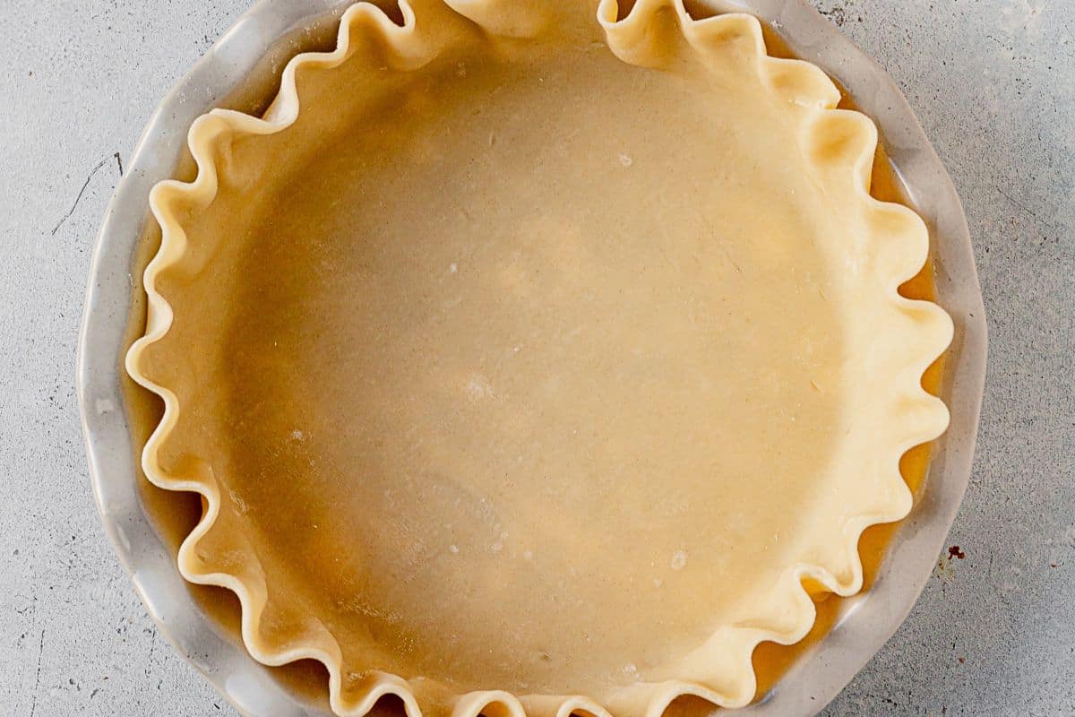 unbaked deep dish pie shell in a pie pan